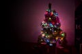 Snow Covered Christmas Tree with Multi Colored Lights Royalty Free Stock Photo