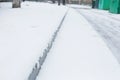 Snow covered city street close up Royalty Free Stock Photo
