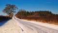 Snow covered country road