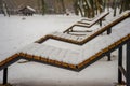 Snow-covered deck chairs