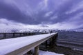 Snow covered dock on Okanagan Lake West Kelowna British Columbia Canada Royalty Free Stock Photo