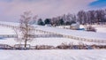 Snow covered farm fields in rural Carroll County, Maryland.