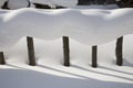 Snow-covered fence Royalty Free Stock Photo