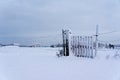 Snow covered fence Royalty Free Stock Photo