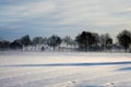 Snow covered fields in a plain country