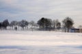 Snow covered fields in a plain country