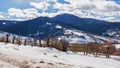snow covered fields in rural area of ukrainian carpathians Royalty Free Stock Photo