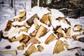 Snow-covered firewood stacks cover up at Ushguli is a four-village community located at the head of the Enguri Gorge in Svaneti