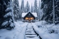 Snow covered footsteps leading to a cabin