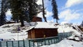 Snow-covered forest rest house