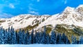 The snow covered granite rock face of Yak Peak in the Zopkios Ridge of the Cascade Mountain Range near the Coquihalla Summit Royalty Free Stock Photo