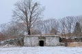 Root Cellar and Stone Wall in Winter Royalty Free Stock Photo