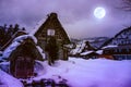 Snow covered the ground in winter. Town with night sky and full Royalty Free Stock Photo