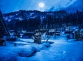 Snow covered the ground in winter. Town with night sky and full Royalty Free Stock Photo