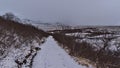 Snow-covered hiking path in Skaftafell in ÃârÃÂ¦fasveit in the south of Iceland with trees on cloudy day in winter. Royalty Free Stock Photo