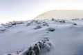 Snow covered hills in mountains Royalty Free Stock Photo