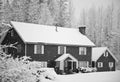Snow covered home in forest Royalty Free Stock Photo