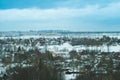 Snow covered houses with the gardens in winter. wooden houses in the forest aerial view. rural landscape Royalty Free Stock Photo