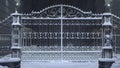 Snow-covered iron gates. winter wrought fence gates Royalty Free Stock Photo