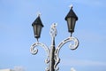 Snow-covered lampposts