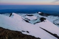 Snow covered landscape on Etna mountain and active volcano at sunset, in Sicily, Italy Royalty Free Stock Photo