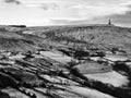 Snow covered landscape with fields and moors near stoodley pike in west yorkshire