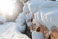 Snow covered log pile Royalty Free Stock Photo