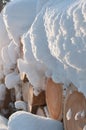 Snow covered log pile Royalty Free Stock Photo