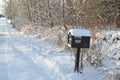 Snow covered mailbox snow morning rural road Royalty Free Stock Photo