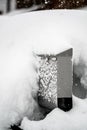 Snow Covered Mailbox. Winter snow caps a mailbox. Snow chaos and catastrophe alert in Bavaria south Germany Winter 2019 Royalty Free Stock Photo