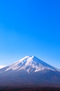Snow covered Mount Fuji and blue sky autumn view from Chureito Pagoda park in Shimoyoshida - Fujiyoshida Royalty Free Stock Photo