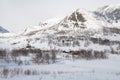 Snow covered mountain landscape with huts in Jotunheim - Norway