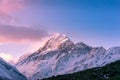 Snow covered mountain peak at sunset. Winter mountains landscape Royalty Free Stock Photo