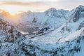 Snow covered mountain range on coastline in winter, Norway. Senja panoramic aerial view, Troms county, Fjordgard