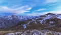 Snow-covered mountains around Cek village at sunset.Azerbaijan Royalty Free Stock Photo