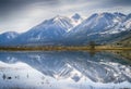 Snow covered mountains with reflections in a flooded field near Genoa, Nevada. USA Royalty Free Stock Photo