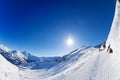 Snow-covered mountains panorama with ski slopes Royalty Free Stock Photo