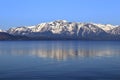 Lake Tahoe with Snow Covered Sierra Nevada Mountains in Early Morning Light, California Royalty Free Stock Photo