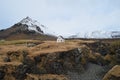 Snow Covered Mountains Surround Hellnar Iceland