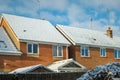 Snow covered new built house roof in england uk Royalty Free Stock Photo