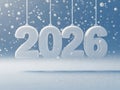 Snow-Covered 2026 Numbers Hanging Against Blue Winter Background Royalty Free Stock Photo