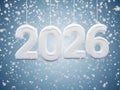 Snow-Covered 2026 Numbers Hanging Against Blue Winter Background Royalty Free Stock Photo