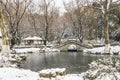 Snow covered old bridge and pavilion Royalty Free Stock Photo