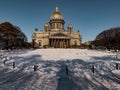 Snow-covered Park in front of St. Isaac's Cathedral in St. Petersburg - Russia in the spring sun Royalty Free Stock Photo