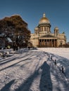 Snow-covered Park in front of St. Isaac's Cathedral in St. Petersburg - Russia in the spring sun Royalty Free Stock Photo