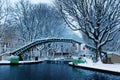 Snow covered pedestrian bridge, Canal Saint Martin Royalty Free Stock Photo