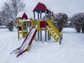 Snow covered playground in winter
