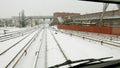 Snow-covered railroad during blizzard in winter.