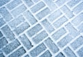 Snow covered rectangular paving