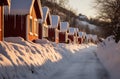 Red cabins in Norwegian winter landscape